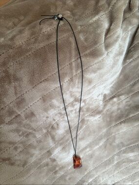 Swarovski Touchstone Amber-Tone Pendant on Black Cord Necklace